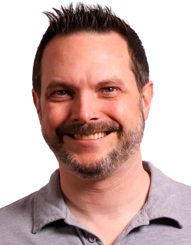 Ryan Morency, BAS co-founder, smiling, in a grey polo